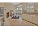 Bright kitchen nook with a view and white cabinetry at 428 Hightower Dr, Debary, FL 32713