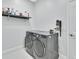 Laundry room with washer, dryer, and storage shelf at 428 Hightower Dr, Debary, FL 32713