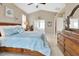 Large main bedroom with ample natural light and en-suite bathroom at 428 Hightower Dr, Debary, FL 32713