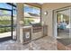 Convenient outdoor kitchen with built-in grill and counter space for alfresco dining at 428 Hightower Dr, Debary, FL 32713