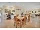 Dining room, with an adjacent workspace, featuring natural light and modern finishes at 4525 Owls Nest Ct, De Leon Springs, FL 32130