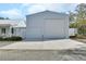 Property featuring a metal building, and parking area at 4525 Owls Nest Ct, De Leon Springs, FL 32130