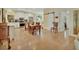 Bright, open kitchen and dining area featuring modern appliances, a center island, and seamless living at 4525 Owls Nest Ct, De Leon Springs, FL 32130