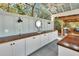 Close up of outdoor bar with counter space and sink at 4525 Owls Nest Ct, De Leon Springs, FL 32130