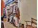 Walk-in closet with extensive custom shelving and organization system for clothing at 4525 Owls Nest Ct, De Leon Springs, FL 32130