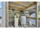 Well house with water treatment system and storage at 4525 Owls Nest Ct, De Leon Springs, FL 32130