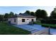 Front view of a single story house with gray siding, and a walkway at 542 N Charles St, Daytona Beach, FL 32114