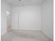 Simple bedroom with carpeted floors and ample space at 555 Morgan Wood Dr, Deland, FL 32724