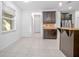Bright dining area with tile floors and window at 555 Morgan Wood Dr, Deland, FL 32724