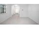 Bright and airy entryway with tile flooring and views to the living room at 555 Morgan Wood Dr, Deland, FL 32724