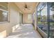 Covered screened porch with a view of the backyard at 555 Morgan Wood Dr, Deland, FL 32724