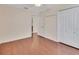 Bedroom with laminate flooring, closet and neutral walls at 641 Hartley Ave, Deltona, FL 32725