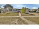 Exterior front view of house with simple landscaping at 641 Hartley Ave, Deltona, FL 32725