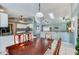 Spacious dining area near the kitchen, complete with stylish countertops and a view into the living room at 709 Lone Oak Dr, Port Orange, FL 32127