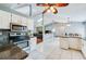 Modern kitchen with stainless appliances, plenty of storage, and view into the living spaces at 709 Lone Oak Dr, Port Orange, FL 32127