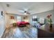 Large main bedroom features stylish wood floors, lots of natural light, and a vanity area at 709 Lone Oak Dr, Port Orange, FL 32127