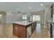 Kitchen island with quartz countertop and stainless steel dishwasher at 731 E Cox St, Deland, FL 32724