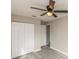 Bedroom with double-door closet and ceiling fan at 916 Tracy St, Daytona Beach, FL 32117