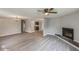 Open living room with a view into the kitchen and fireplace at 916 Tracy St, Daytona Beach, FL 32117