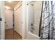 Bathroom featuring a shower-tub combo with a modern shower curtain at 101 Los Arbor Dr, Deland, FL 32724