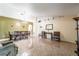 Spacious dining area with tile floors and a view of the living room at 101 Los Arbor Dr, Deland, FL 32724