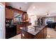 Kitchen island with granite countertops and stainless steel appliances at 101 Los Arbor Dr, Deland, FL 32724