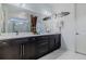 Modern bathroom with double vanity and marble flooring at 1137 Avery Meadows Way, Deland, FL 32724