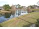 Pond with view of community buildings at 121 Reserve Cir # 209, Oviedo, FL 32765