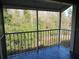 Screened balcony overlooking wooded area at 121 Reserve Cir # 209, Oviedo, FL 32765