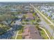 Aerial shot of well-kept townhomes with manicured landscaping, and community pool at 1260 Charter Oaks Cir, Daytona Beach, FL 32117