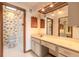 Main bathroom with a walk-in shower and double vanity at 1260 Charter Oaks Cir, Daytona Beach, FL 32117