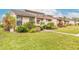 Side view of villa showcasing neat landscaping and exterior at 1260 Charter Oaks Cir, Daytona Beach, FL 32117