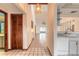 Kitchen with view into living area and access to the dining area at 1260 Charter Oaks Cir, Daytona Beach, FL 32117