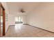 Living room with access to a sunroom and tile floors at 1260 Charter Oaks Cir, Daytona Beach, FL 32117