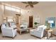 Bright living room with modern seating, a coffee table, and neutral walls at 1260 Charter Oaks Cir, Daytona Beach, FL 32117
