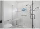 Clean bathroom with a large walk-in shower and built in seat at 129 Oyster Catcher Ct, Daytona Beach, FL 32119