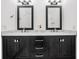 Elegant bathroom with double vanity and marble countertops at 129 Oyster Catcher Ct, Daytona Beach, FL 32119