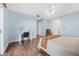 Light and airy bedroom with wood floors and a workspace at 129 Oyster Catcher Ct, Daytona Beach, FL 32119