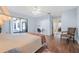 Spacious bedroom with wood floors and access to a private patio at 129 Oyster Catcher Ct, Daytona Beach, FL 32119