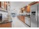Modern kitchen with granite countertops and stainless steel appliances at 129 Oyster Catcher Ct, Daytona Beach, FL 32119