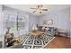 Cozy living room with wood floors and stylish furnishings at 129 Oyster Catcher Ct, Daytona Beach, FL 32119