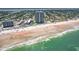 Aerial view of beachfront building and surrounding area at 1420 N Atlantic Ave # 1102, Daytona Beach, FL 32118