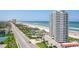 Aerial view showing beachfront property and ocean at 1420 N Atlantic Ave # 1102, Daytona Beach, FL 32118