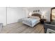 Bedroom with a queen-size bed and plenty of closet space at 1420 N Atlantic Ave # 1102, Daytona Beach, FL 32118