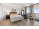 Bedroom with a queen-size bed, ocean view, and ample closet space at 1420 N Atlantic Ave # 1102, Daytona Beach, FL 32118