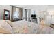 Bright bedroom with king-size bed and ocean view at 1420 N Atlantic Ave # 1102, Daytona Beach, FL 32118