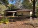 Home's backyard with a screened porch at 1525 S Hayden Rd, Deland, FL 32724