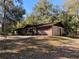 Ranch-style home with attached garage and large yard at 1525 S Hayden Rd, Deland, FL 32724