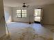 Simple living room with wood floors and a door to the outside at 1525 S Hayden Rd, Deland, FL 32724