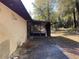 Small screened porch with concrete patio at 1525 S Hayden Rd, Deland, FL 32724